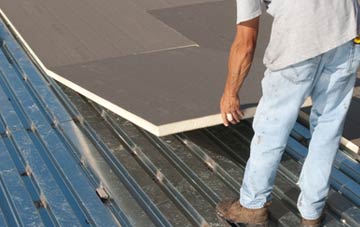 benefits of insulating Dolanog flat roofing
